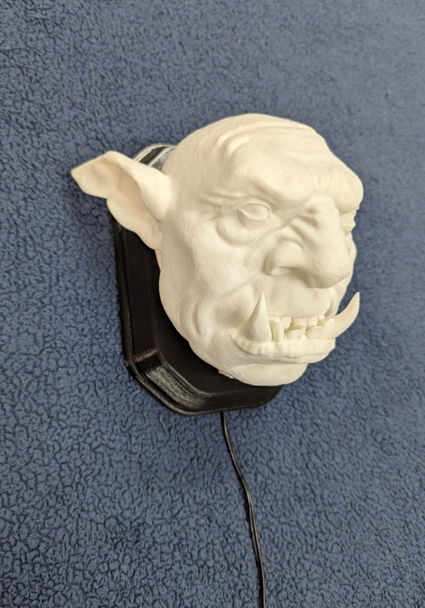 Cave Troll Head  wall trophy lamp to decorate your room: bedroom, playroom or office.